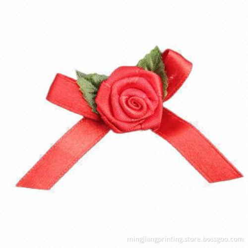 Ribbon Bow with Rose and Green Leaves